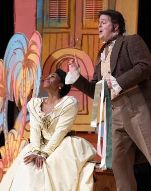 Scene from the Barber of Seville with Rosina and Figaro.