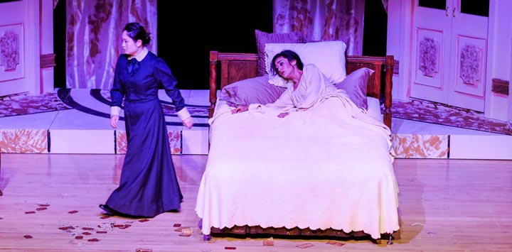 Final act of La Traviata with Violetta in sick bed.